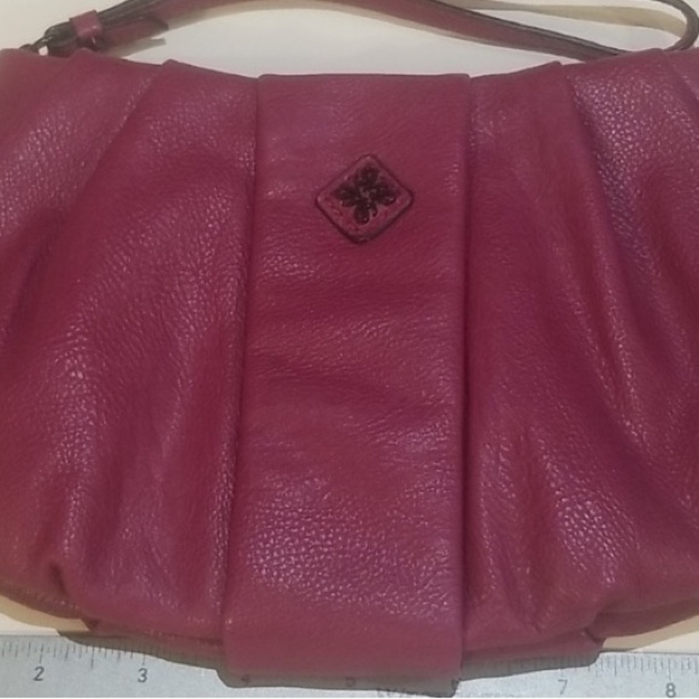 Vera Wang WRISTLET in a pinkish purple vibrant color